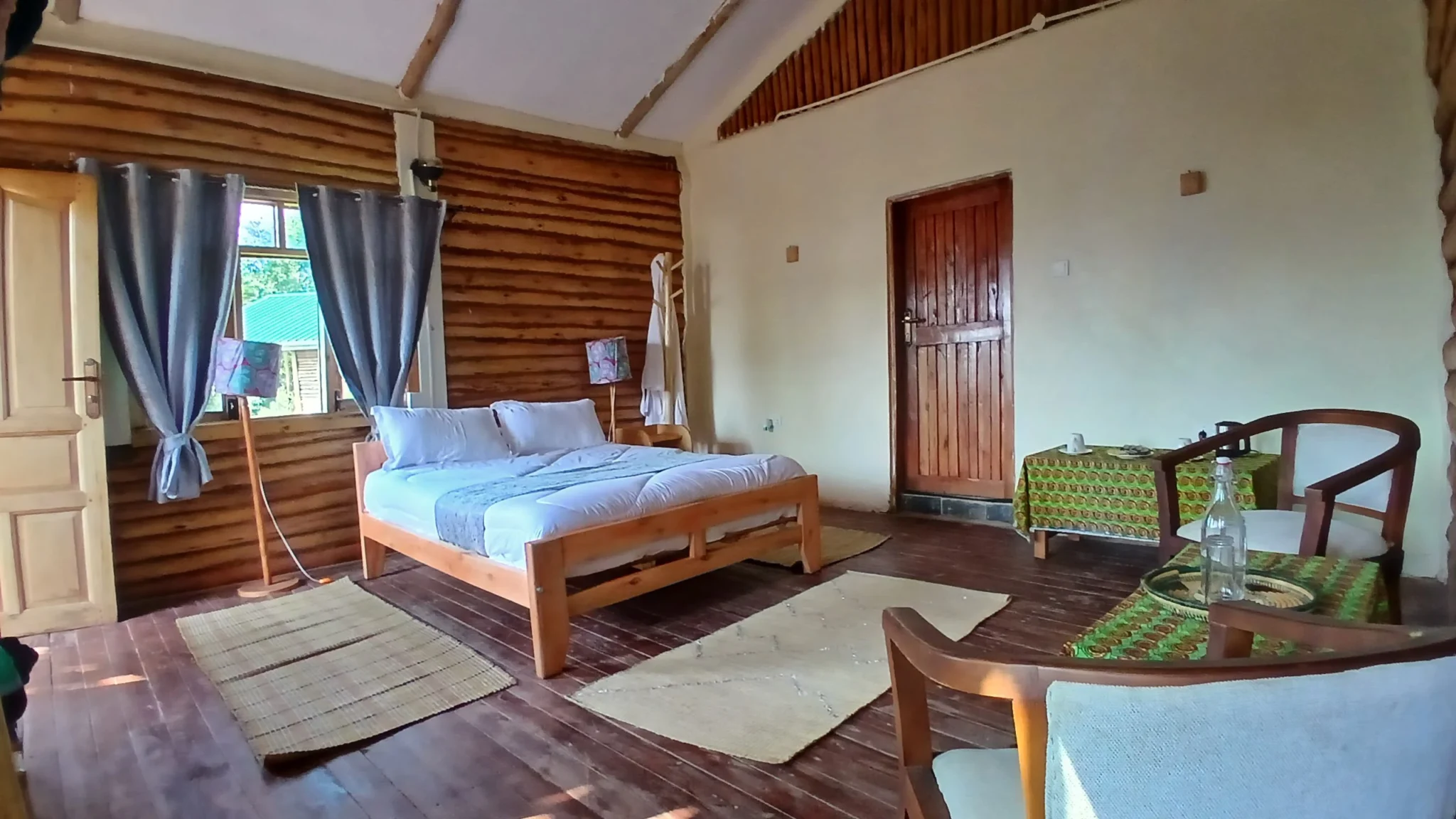 Cozy Parents room for the family cottage at Orugano Bwindi Lodge