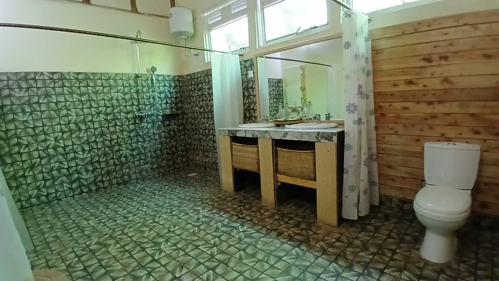Cozy spacious bathroom interior at Orugano Bwindi Lodge