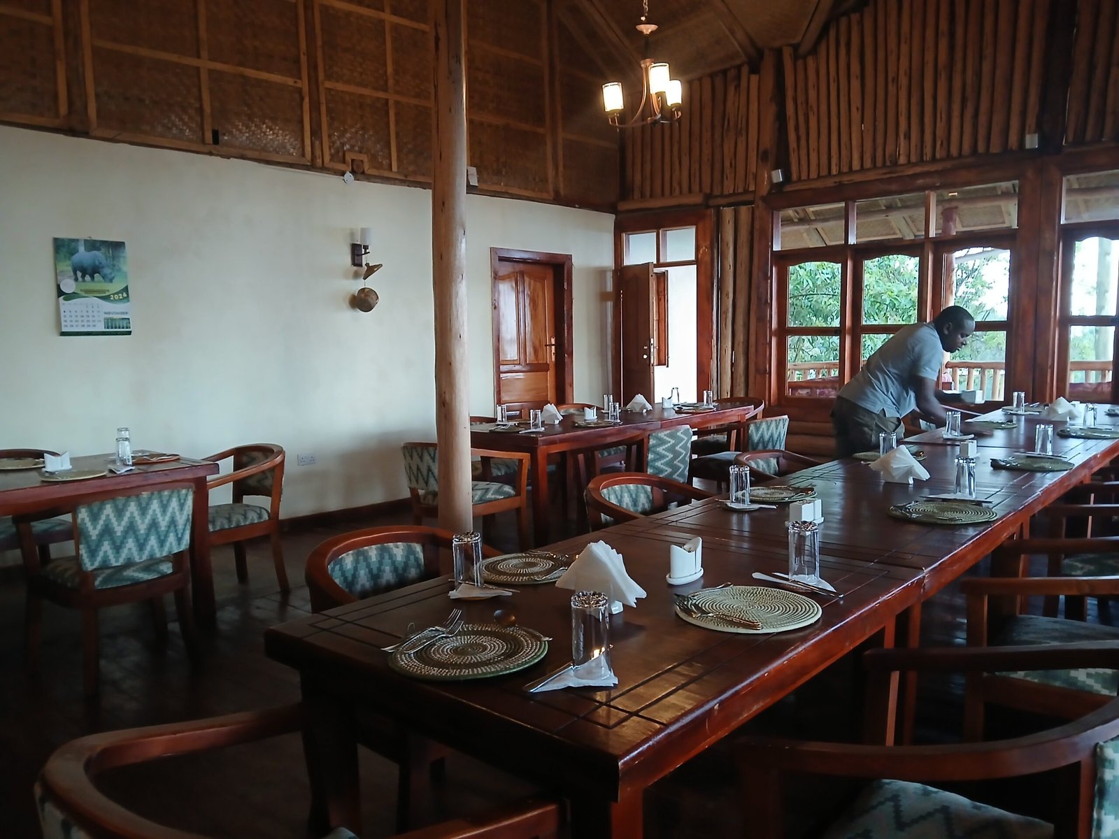 Friendly hospitality and local guides at Orugano Bwindi Lodge in Uganda.